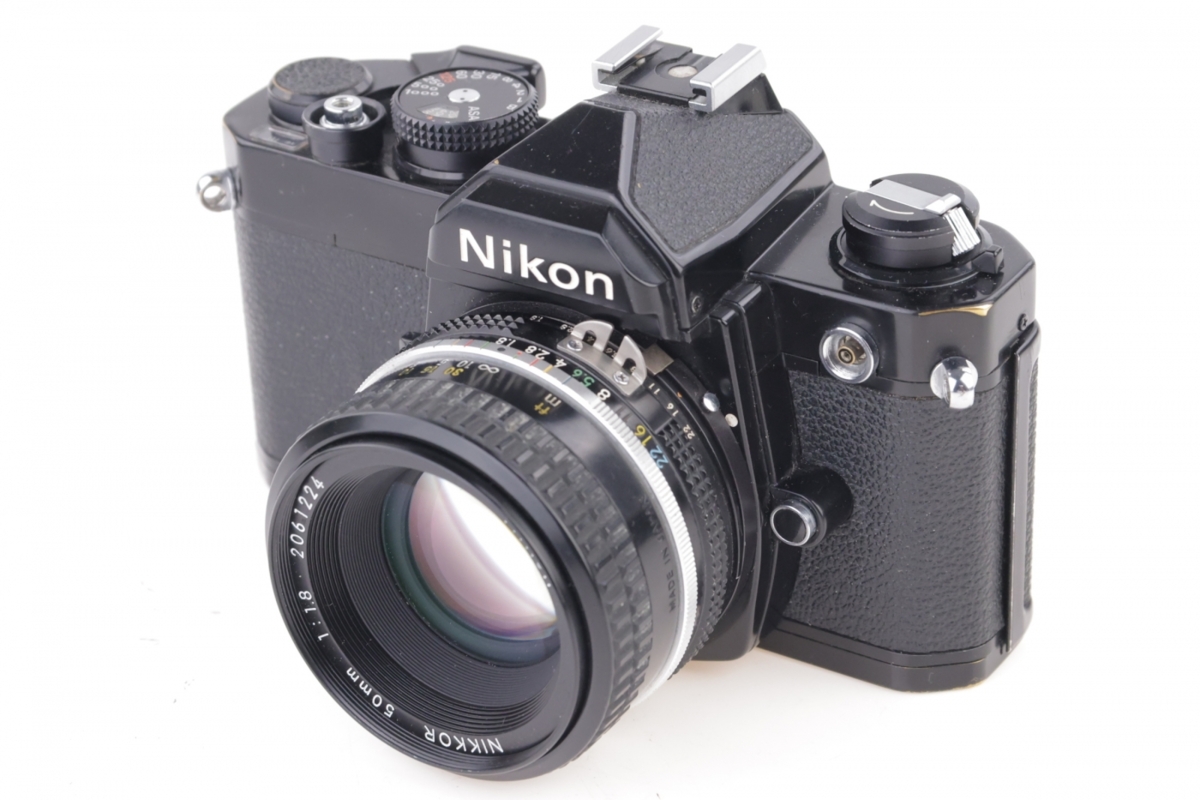 Nikon FM + 50/1.8 + MD-117 Nikon FM + 50/1.8 + MD-117